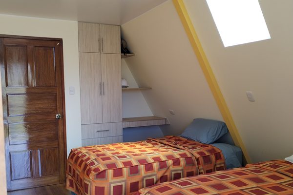 Habitación doble bajo el techo a dos aguas