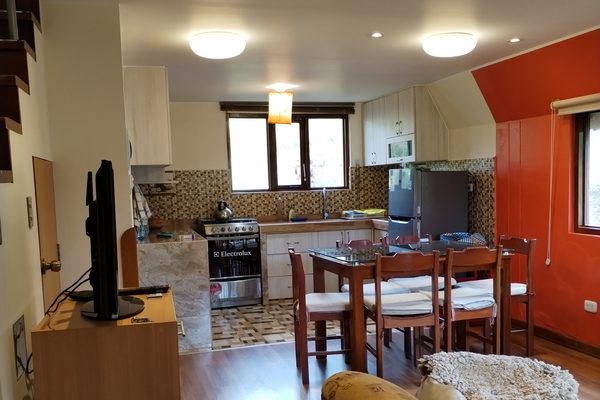 Ambiente integrado de sala, comedor y cocina
