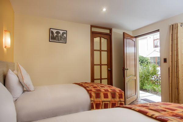 Habitación twin con salida al jardín